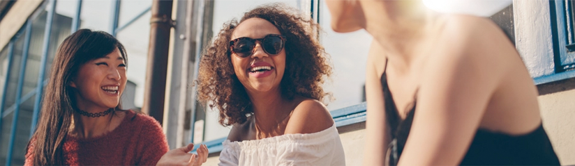 Three friends in discussion over when to visit Galaxy Credit, a top-rated licensed money lender in Ang Mo Kio that offers legal loans in Singapore